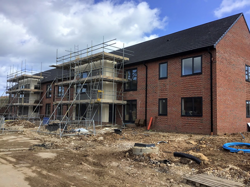 Multiple housing fire suppression installation